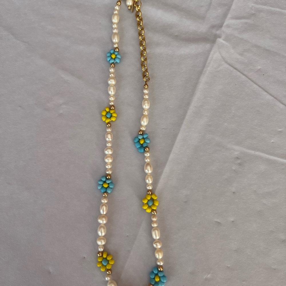 Eliou Pearl Necklace with Blue and Yellow Floral Details